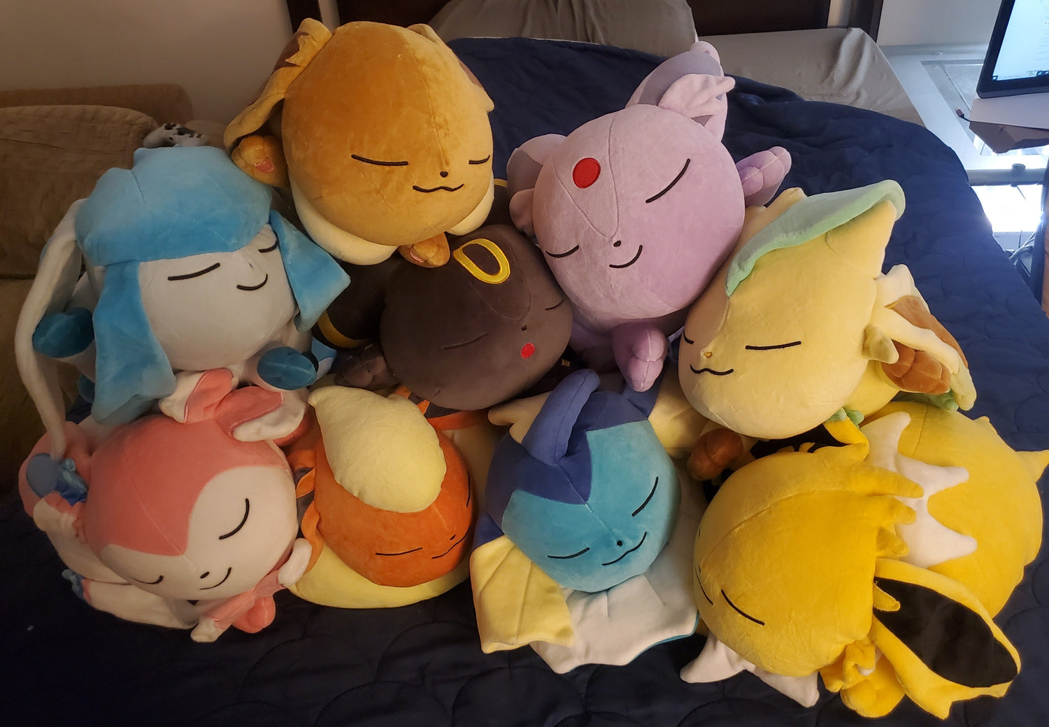 Pokemon Center Eeveelution Plushes