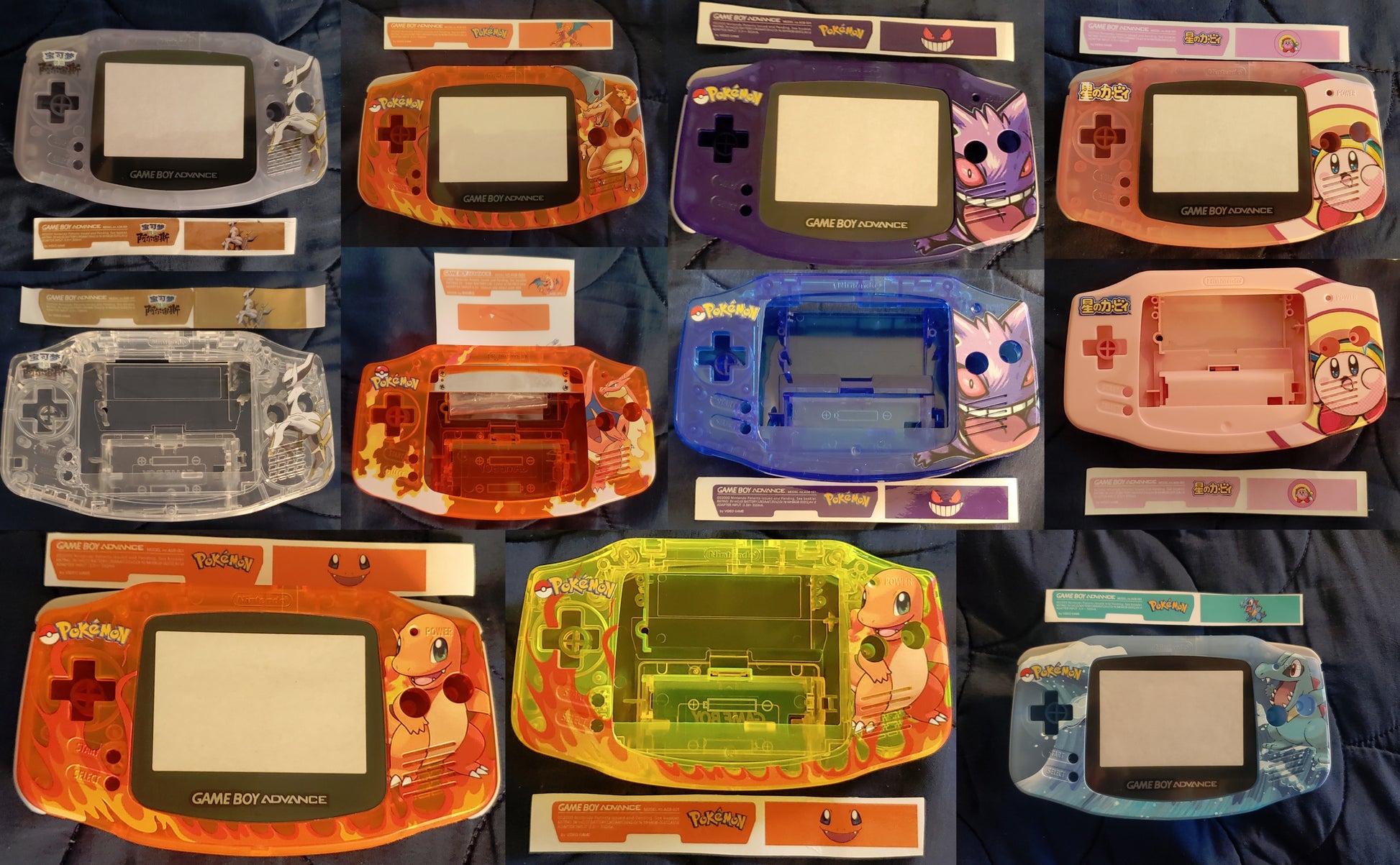 Collection of various Game Boy Advance SP consoles on a dark surface